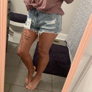 Size 0 distressed shorts